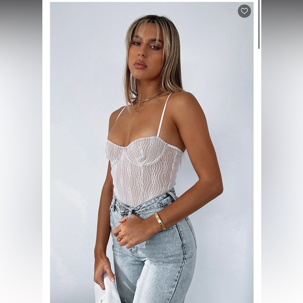 White fox “keep wishing mesh bodysuit.”